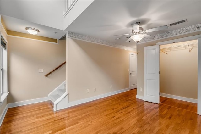 interior space featuring ceiling fan and light hardwood / wood-style flooring