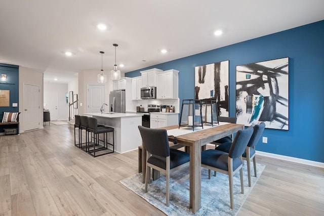 104 Chapel Hill Pkwy, Newnan, GA 30263 - dining area featuring light wood-style flooring, baseboards, and recessed lighting