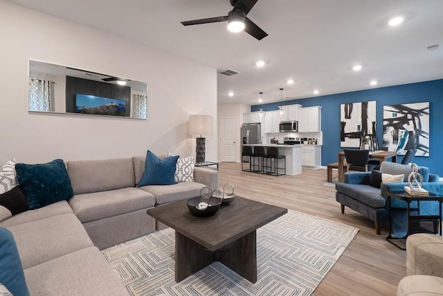 104 Chapel Hill Pkwy, Newnan, GA 30263 - living room featuring ceiling fan, recessed lighting, light wood-style flooring, and visible vents