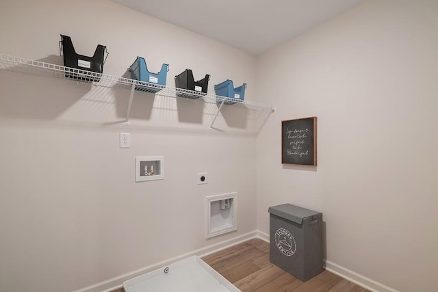 104 Chapel Hill Pkwy, Newnan, GA 30263 - laundry area with wood finished floors, laundry area, hookup for an electric dryer, baseboards, and hookup for a washing machine