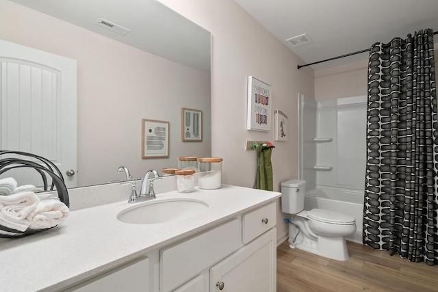 104 Chapel Hill Pkwy, Newnan, GA 30263 - full bathroom with toilet, shower / bathtub combination with curtain, visible vents, and wood finished floors
