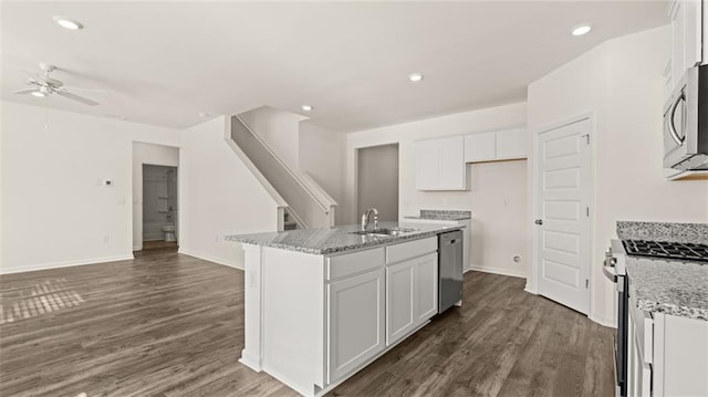 1316 Village Brook Dr, Dacula, GA 30019 - kitchen featuring stainless steel appliances, a ceiling fan, white cabinetry, dark wood-style floors, and recessed lighting
