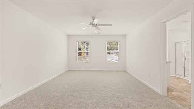 1316 Village Brook Dr, Dacula, GA 30019 - spare room featuring ceiling fan and light carpet