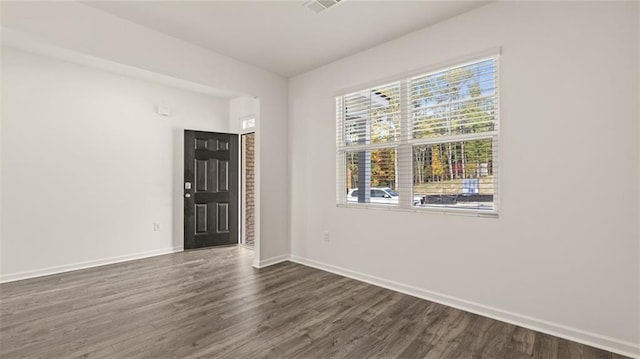 1316 Village Brook Dr, Dacula, GA 30019 - empty room with dark wood-style floors and baseboards