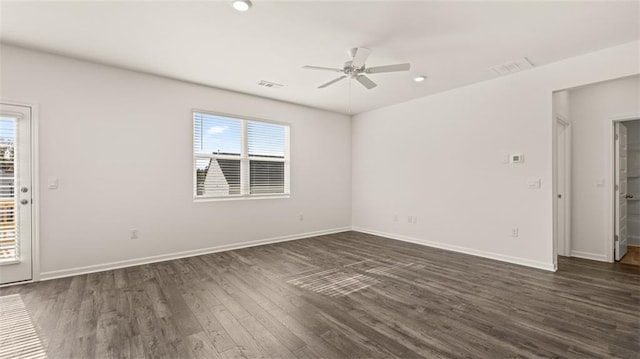 1316 Village Brook Dr, Dacula, GA 30019 - empty room with healthy amount of natural light, dark wood finished floors, a ceiling fan, and recessed lighting