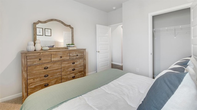 1316 Village Brook Dr, Dacula, GA 30019 - carpeted bedroom featuring baseboards and a closet