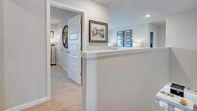 1316 Village Brook Dr, Dacula, GA 30019 - corridor with light colored carpet and recessed lighting