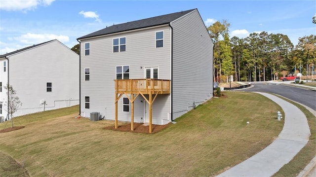 1316 Village Brook Dr, Dacula, GA 30019 - rear view of house featuring a lawn and a wooden deck