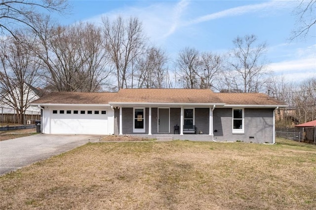 view of front facade with covered porch, an attached garage, fence, driveway, and a front lawn