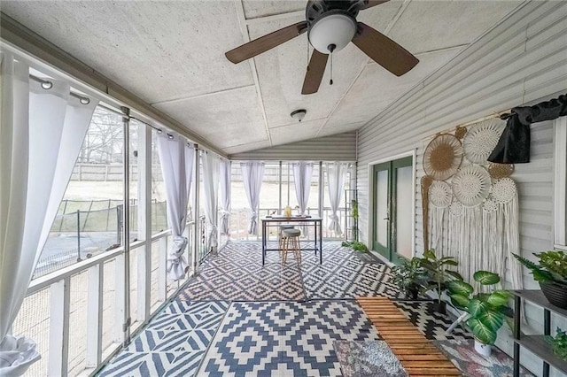 sunroom / solarium with vaulted ceiling and ceiling fan