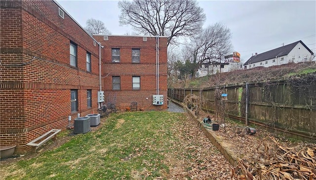 view of yard with central AC unit