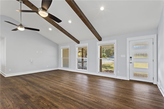 unfurnished living room with lofted ceiling with beams, baseboards, and dark wood-type flooring