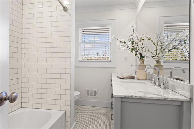 full bathroom with a wealth of natural light, visible vents, toilet, and ornamental molding