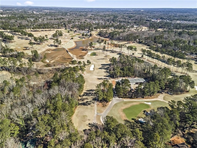 birds eye view of property with view of golf course