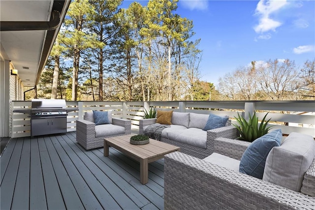 wooden deck featuring grilling area and outdoor lounge area