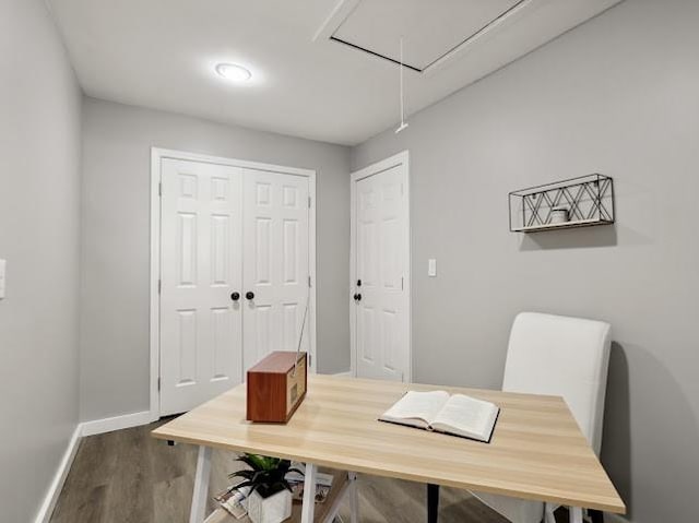 office with attic access, wood finished floors, and baseboards