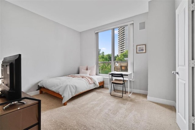 2626 Peachtree Rd NW Unit 606, Atlanta, GA 30305 - full bathroom featuring toilet, vanity, tile patterned floors, and shower / bathtub combination with curtain