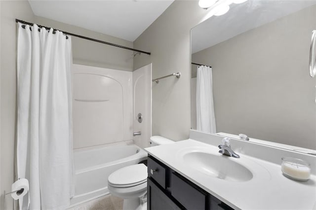 full bathroom featuring vanity, toilet, and shower / bath combo with shower curtain