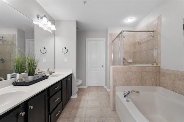 full bathroom featuring tile patterned flooring, vanity, plus walk in shower, and toilet