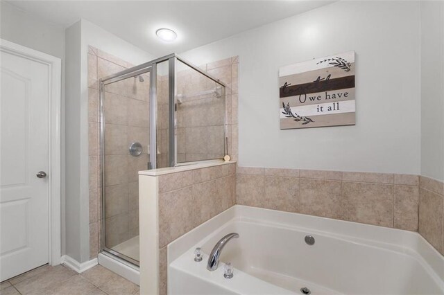 bathroom with plus walk in shower and tile patterned floors