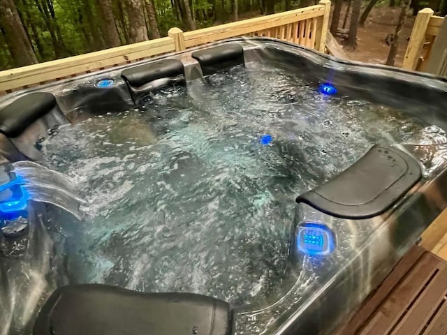 exterior space with a sink and a hot tub