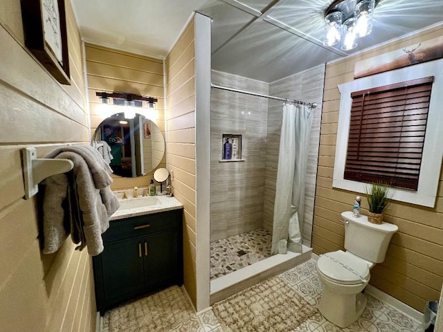 full bath with tile patterned flooring, toilet, a shower stall, and vanity