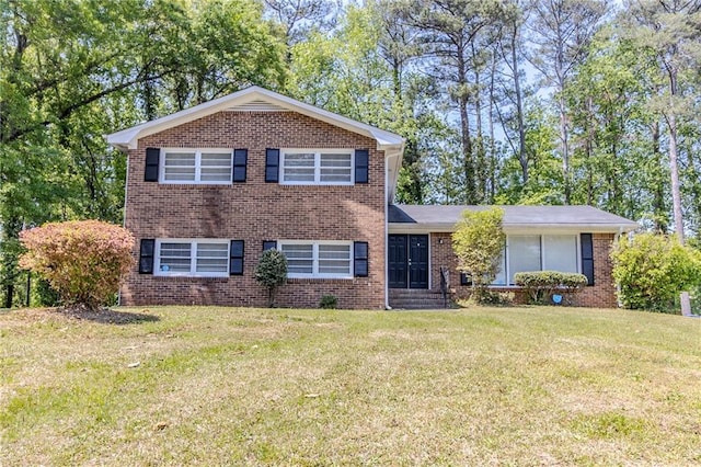 738 Laverne Dr NW, Atlanta, GA 30318 - tri-level home featuring brick siding and a front lawn