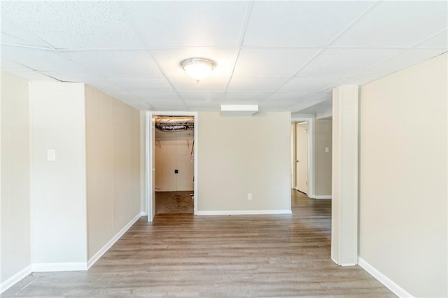 738 Laverne Dr NW, Atlanta, GA 30318 - spare room featuring baseboards, light wood-style flooring, and a drop ceiling