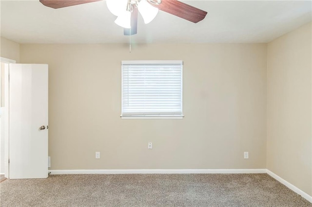 738 Laverne Dr NW, Atlanta, GA 30318 - carpeted empty room with baseboards and a ceiling fan