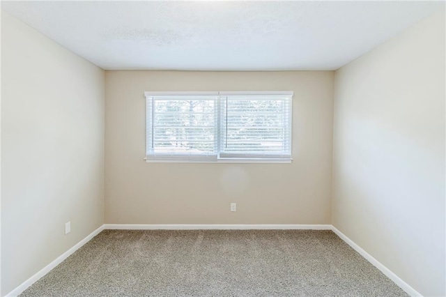 738 Laverne Dr NW, Atlanta, GA 30318 - empty room featuring carpet and baseboards