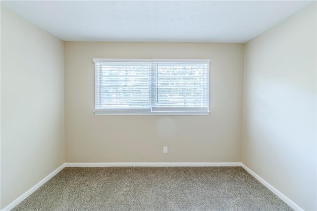 738 Laverne Dr NW, Atlanta, GA 30318 - carpeted empty room with baseboards