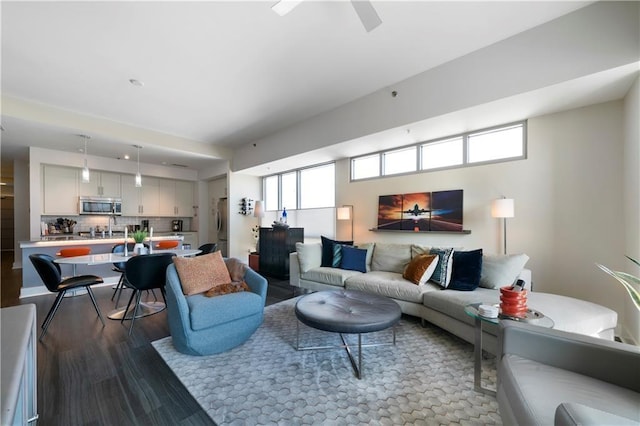 1100 Howell Mill Rd NW Unit 708, Atlanta, GA 30318 - living area with dark wood-type flooring and a ceiling fan