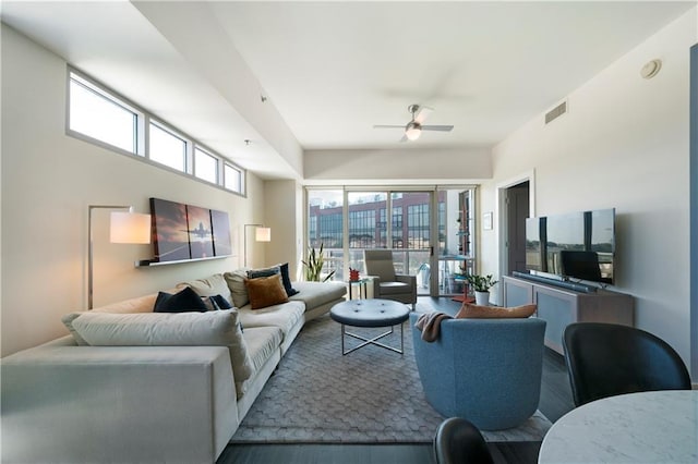 1100 Howell Mill Rd NW Unit 708, Atlanta, GA 30318 - living area with ceiling fan and wood finished floors
