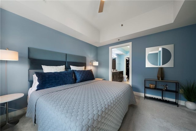 1100 Howell Mill Rd NW Unit 708, Atlanta, GA 30318 - bedroom featuring carpet flooring, a raised ceiling, and a ceiling fan