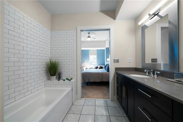 1100 Howell Mill Rd NW Unit 708, Atlanta, GA 30318 - ensuite bathroom featuring vanity, a garden tub, tile patterned flooring, and ceiling fan