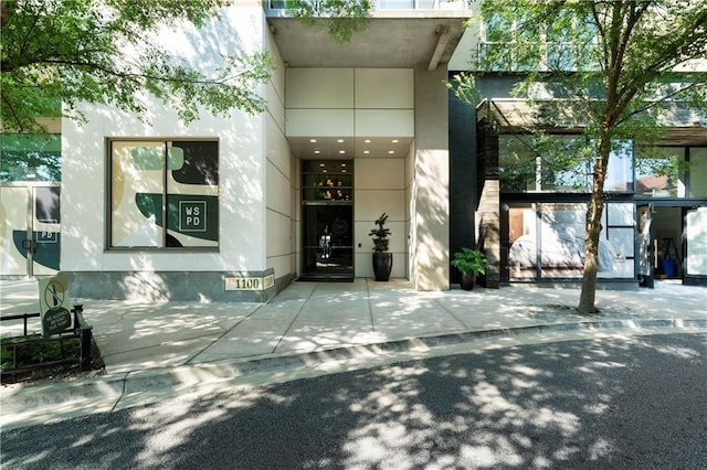 1100 Howell Mill Rd NW Unit 708, Atlanta, GA 30318 - view of exterior entry with stucco siding