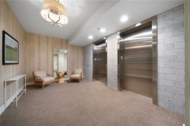 1100 Howell Mill Rd NW Unit 708, Atlanta, GA 30318 - living area featuring carpet flooring and elevator