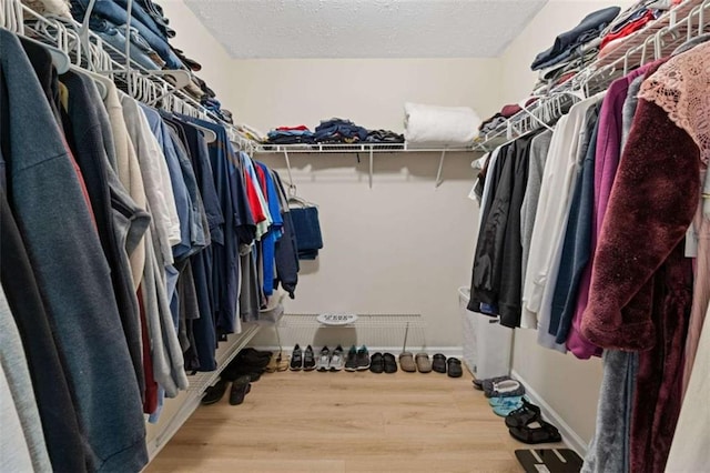 1450 Steam Engine Way, Conyers, GA 30013 - spacious closet featuring wood finished floors