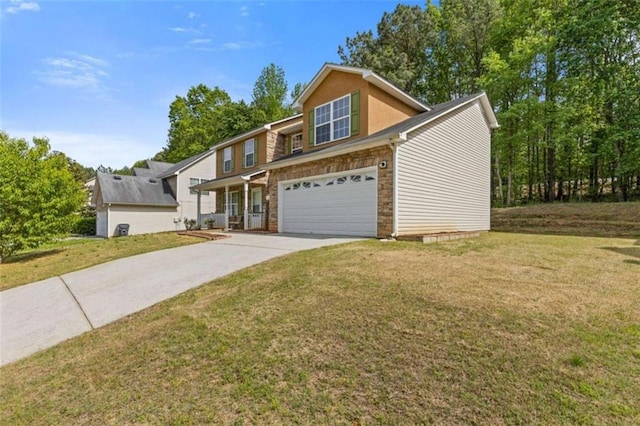 1450 Steam Engine Way, Conyers, GA 30013 - view of front facade featuring an attached garage, concrete driveway, a front lawn, and stone siding