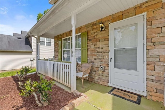 1450 Steam Engine Way, Conyers, GA 30013 - view of exterior entry with covered porch and stone siding