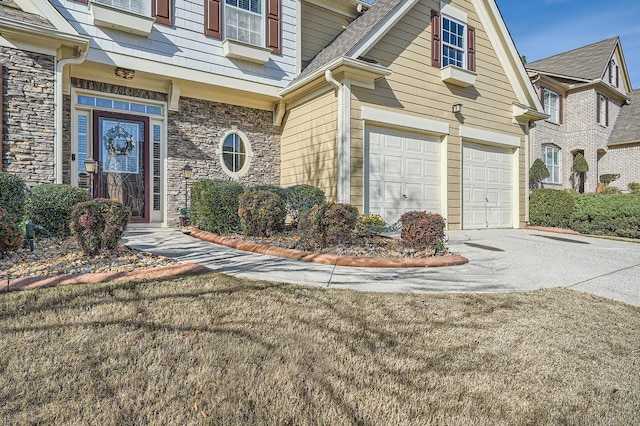 front of property with a garage