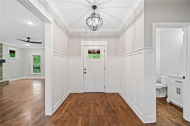 4189 Tamarack Dr, Jasper, GA 30143 - foyer entrance featuring ornamental molding, a chandelier, wood finished floors, a ceiling fan, and a decorative wall