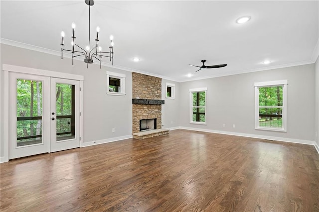 4189 Tamarack Dr, Jasper, GA 30143 - unfurnished living room featuring crown molding, a ceiling fan, dark wood-style flooring, baseboards, and a fireplace