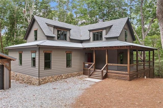 4189 Tamarack Dr, Jasper, GA 30143 - view of front facade with covered porch, a shingled roof, and metal roof