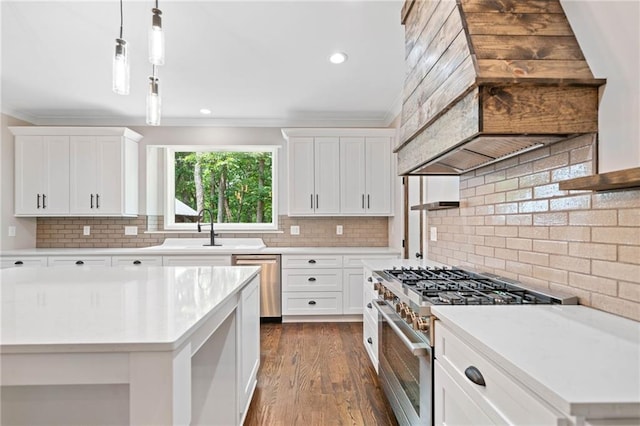 4189 Tamarack Dr, Jasper, GA 30143 - kitchen featuring stainless steel appliances, tasteful backsplash, light countertops, ornamental molding, and recessed lighting