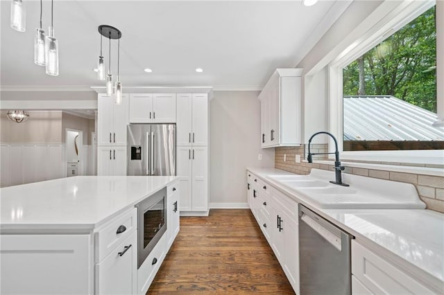 4189 Tamarack Dr, Jasper, GA 30143 - kitchen featuring stainless steel appliances, decorative backsplash, recessed lighting, white cabinets, and light countertops
