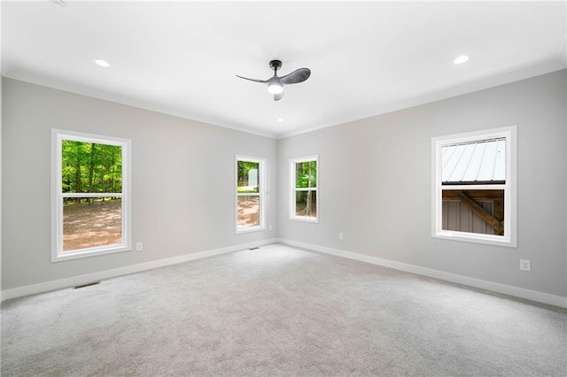 4189 Tamarack Dr, Jasper, GA 30143 - carpeted empty room featuring healthy amount of natural light, baseboards, recessed lighting, ceiling fan, and ornamental molding