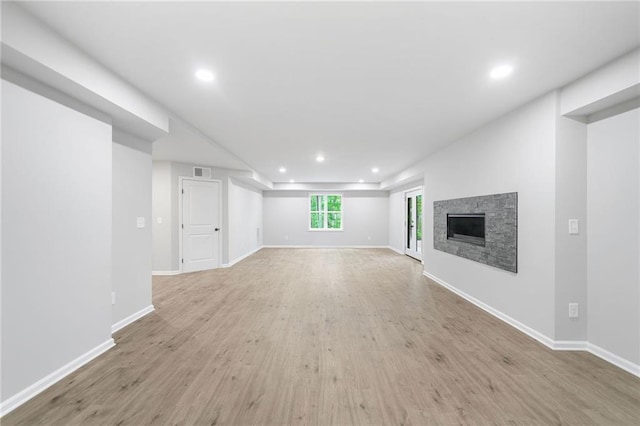 4189 Tamarack Dr, Jasper, GA 30143 - unfurnished living room featuring recessed lighting, light wood-type flooring, baseboards, and a fireplace