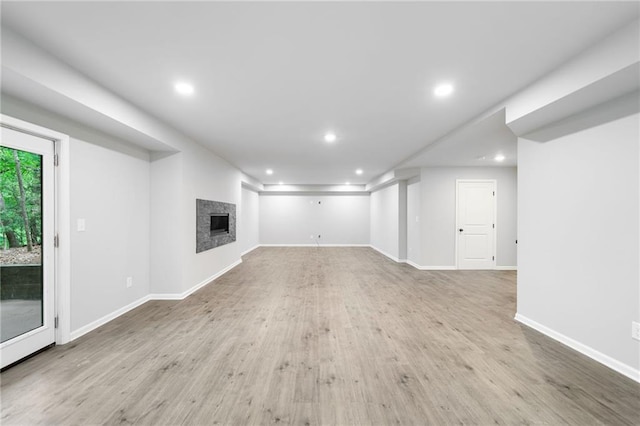 4189 Tamarack Dr, Jasper, GA 30143 - unfurnished living room featuring recessed lighting, a fireplace, wood finished floors, and baseboards