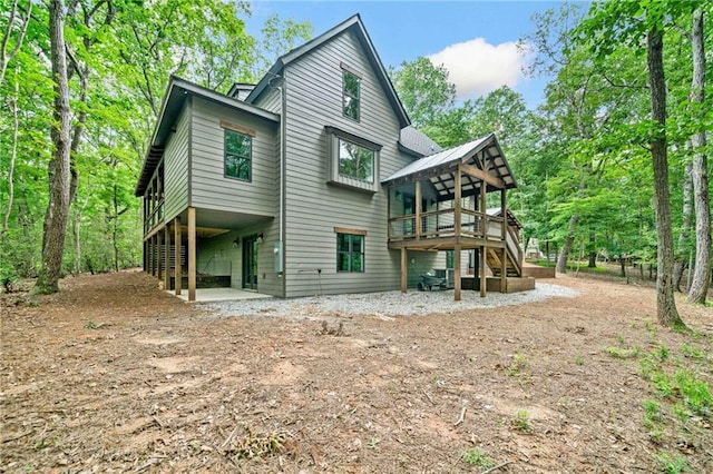 4189 Tamarack Dr, Jasper, GA 30143 - back of house featuring stairs, a wooden deck, and a patio